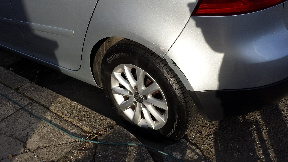 Wheel arch scuff repair before